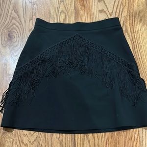 Black mini skirt with fringe